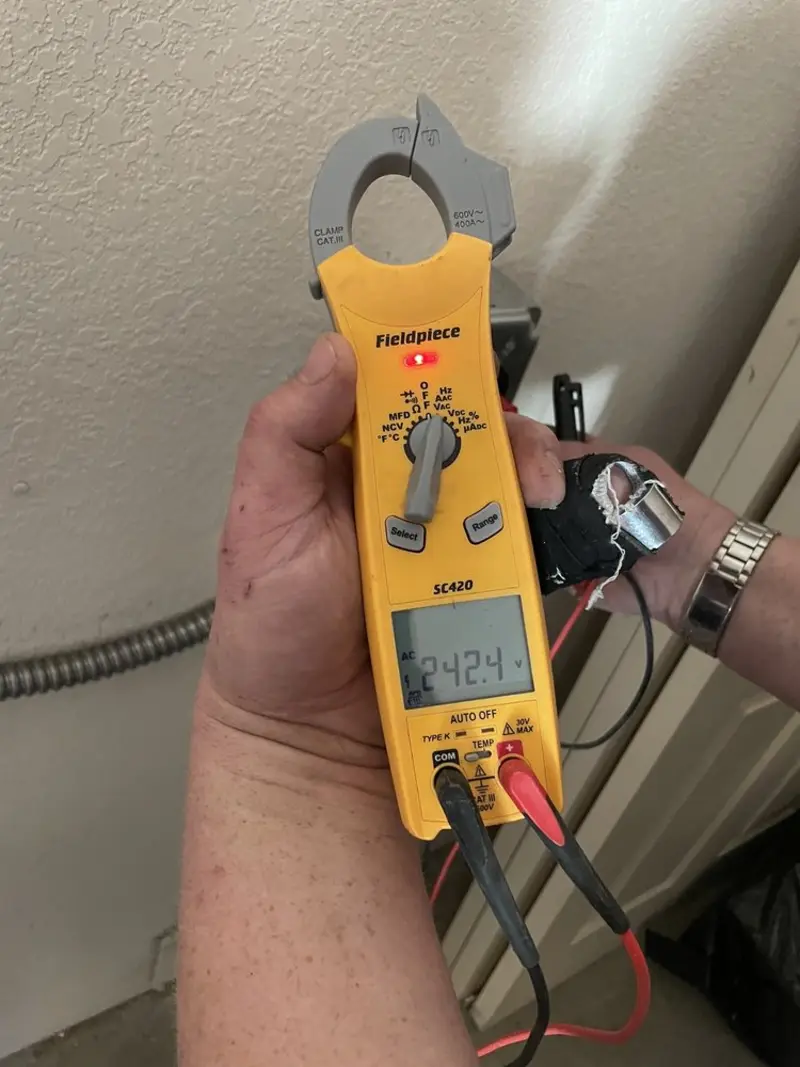 Voltage testing with clamp meter during Circuit Breaker Repair in Orchard City